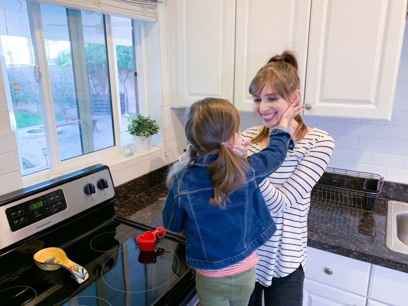 Mom and daughter having a sweet moment