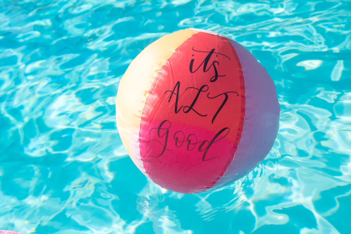 Beach ball in pool